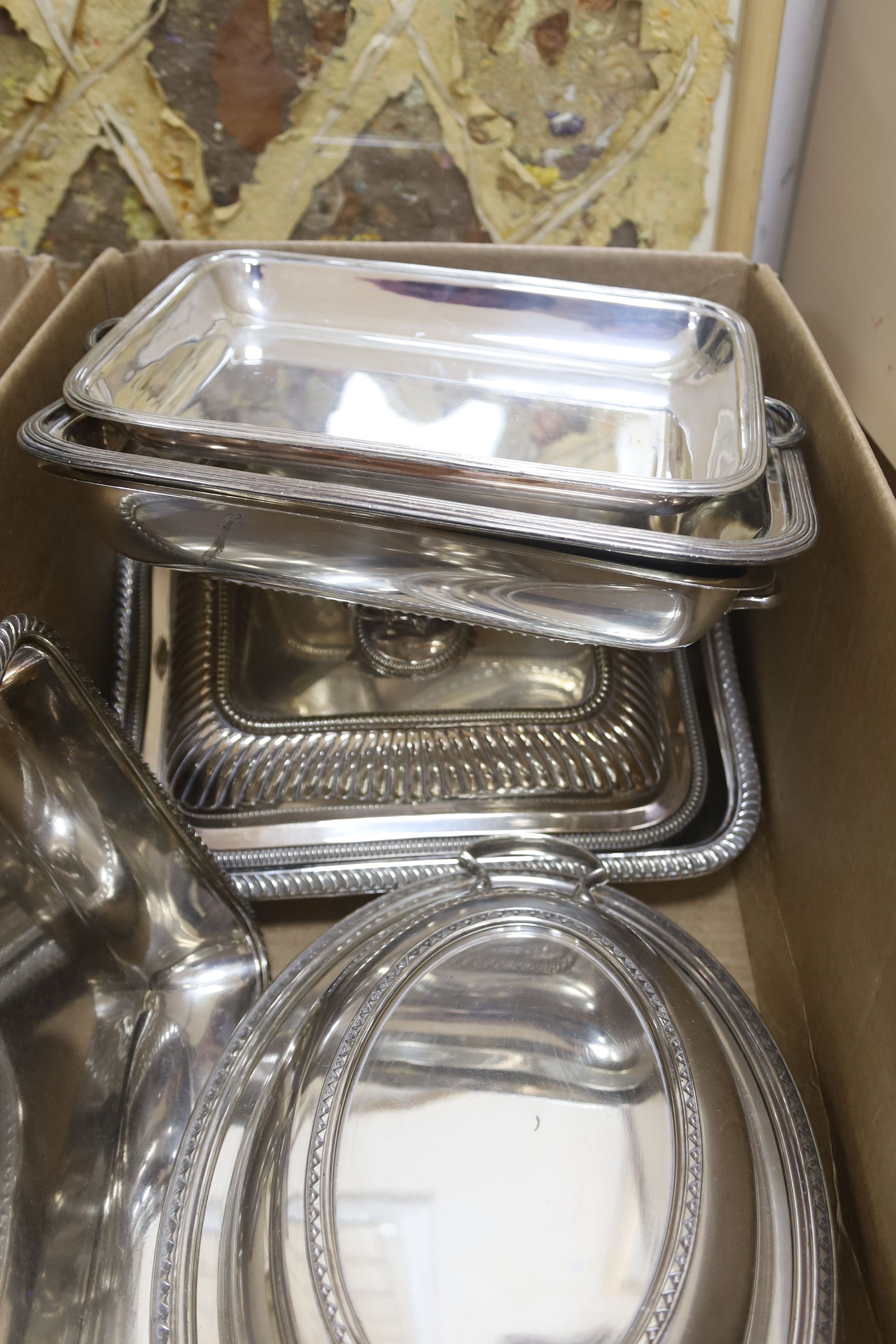 Three silver plated entree dishes with covers and handles and a group of assorted entree dishes, etc.